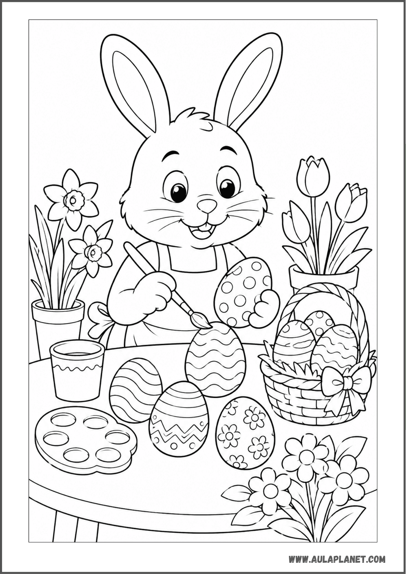 Conejito decorando huevos de Pascua