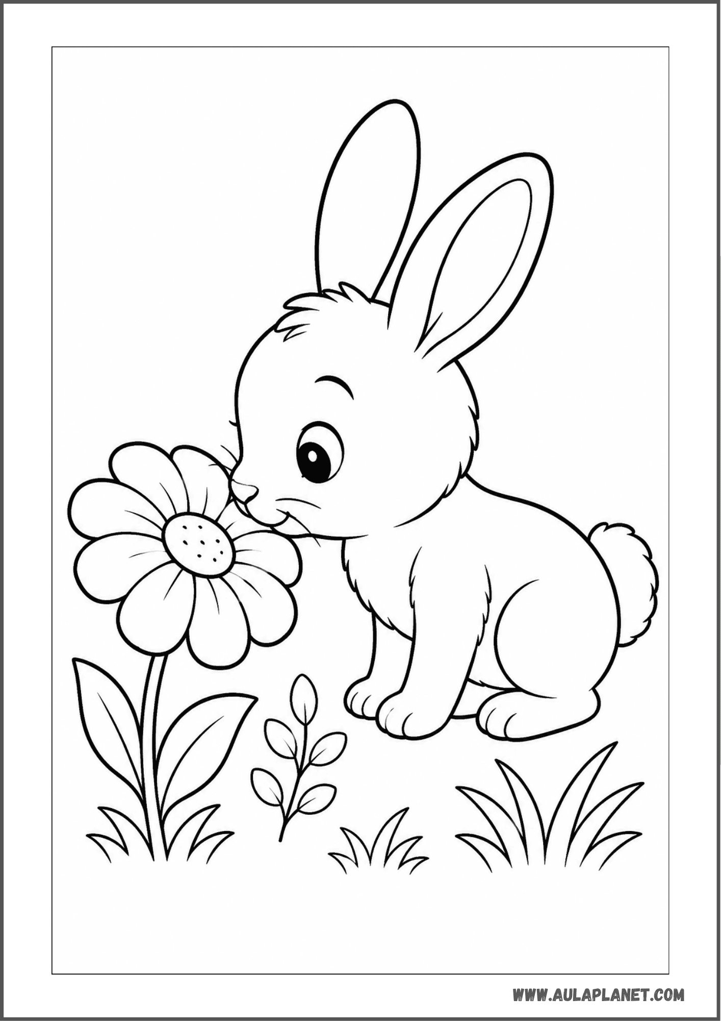 Conejito oliendo una flor